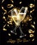 Sparkling glasses of champagne with Gold serpentine on black background, bokeh effect with sign Happy New Year