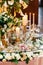 Sparkling glassware stands on table prepared for elegant wedding