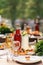 Sparkling glassware stands on table prepared for wedding.