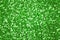 Sparkling green sequin textile background