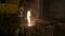 A sparkling ladle filled with liquid molten metal