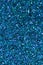 Sparkling macro image of deep blue glitter texture