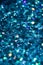 Sparkling macro image of deep blue glitter texture