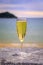 Sparkling Spanish cava wine at Concha bay beach in San Sebastian Spain at sunset