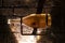 Sparkling wine production by traditional methods in underground cellars in Vienna, Austria. Sediment in bottle