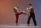 Sparring of boxers two fighting males in boxing gloves during battle, martial arts, mixed fight concept