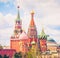 Spasskaya Clock Tower of Moscow Kremlin and nearby towers of Saint Basil