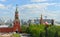 Spasskaya tower of Kremlin against background of Moscow panorama