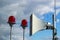 Speaker speaker and red signal lights on the roof of a high-rise building, warning system for high-rise situations