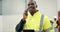 Speaking, engineer and black man with a tablet, calling and contractor with communication. Planning, employee and