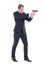 Special agent man in business suit posing with gun isolated on w