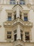 Special corner windows in an ancient decorated  building of Prague in Czech Republic.