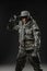 Special forces soldier man with Machine gun on a dark background