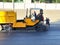 Special machinery asphalt roller . Asphalt paver, road repair vehicle. Photo