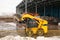 Special machinery or bulldozer work on the site of waste unloading at the plant for waste disposal.