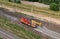 Special train with a landing crane for service and repair of electrical networks on the railway. Workers doing service work on