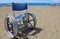 Special wheelchair with big wheel in aluminium on the beach