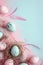 Speckled Easter eggs nestled in a nest with soft feathers. AI Generated