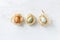 Speckled Easter Eggs in nests and in a row flat lay arrangement