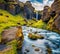 Spectacular afternoon view of Kvernufoss watterfall. Colorful summer scene of pure water river in Iceland, Europe.