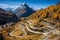 Spectacular autumn landscape of maloja pass, switzerland serpentine road in swiss alps