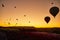 Spectacular balloons flying at sunrise in Goreme. Turism Cappadocia, Turkey