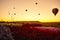 Spectacular balloons flying at sunrise in Goreme. Turism Cappadocia, Turkey