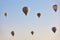 Spectacular balloons flying at sunrise in Goreme. Turism Cappadocia, Turkey