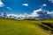 Spectacular Cloud Formation Over The Green Cliffs At Clachtoll Beach Near Lochinver In Scotland