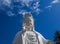 Spectacular cloud over the statue of GuanYin, the Goddess of Mercy and Compassion in the buddhist religion