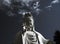 Spectacular cloud over the statue of GuanYin, the Goddess of Mercy and Compassion in the buddhist religion