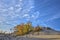 Spectacular cloudscape with autumn leaf color in the sand dune