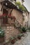 Spectacular colorful traditional italian medieval alley in the historic center of beautiful little town of Spello Perugia