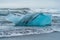 Spectacular deep blue iceberg in diamond beach