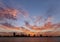 Spectacular diverging clouds & Bahrain skyline on sunset