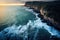 Spectacular drone photo of seascape ocean wave crashing rocky cliff with sunset.