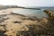 Spectacular empty beach with sand and black stones at sunrise, Playa Flamingo beach, Lanzarote volcanic island, Spain