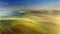 Spectacular foggy wind turbine at sunrise, aerial view