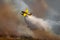Spectacular hydroplane dropping water over the wild fire
