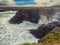 Spectacular Irish seascape with rough stone coast line and powerful Atlantic ocean. Kilkee area, Ireland. Dramatic sky. Detailed