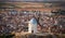 Spectacular isolated Consuegra old windmill and the city