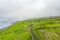 Spectacular misty aerial landscape in the Burren region of County Clare, Ireland. Exposed karst limestone bedrock at the Burren