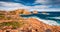 Spectacular morning view of Pietra cape with Phare de la Pietra lighthouse on background.