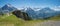 Spectacular mountain panorama and cliff walk at Grindelwald First summit, tourist attraction bernese oberland, view to swiss alps