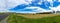 Spectacular panorama of countryside road and field