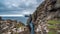 Spectacular sliding camera timelapse of steep coast of Faroe Islands