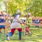 Spectacular staged battles of Slavic warriors and knights at the festival in Zagorodny Park