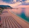 Spectacular summer sunrise in Numana public beach. Splendid seascape of Adriatic sea.