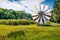 Spectacular summer view of traditional romanian windmill. Perfect rural scene of Transylvania, Romania, Europe. Beauty of countrys