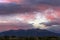 A spectacular sunset colors the clouds over Blanca Peak in the Sangre de Cristo range of the Rocky Mountains